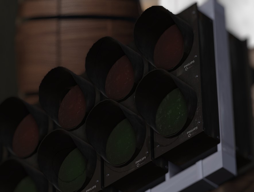 Close view of a bank of circular ride signal lights in a black housing