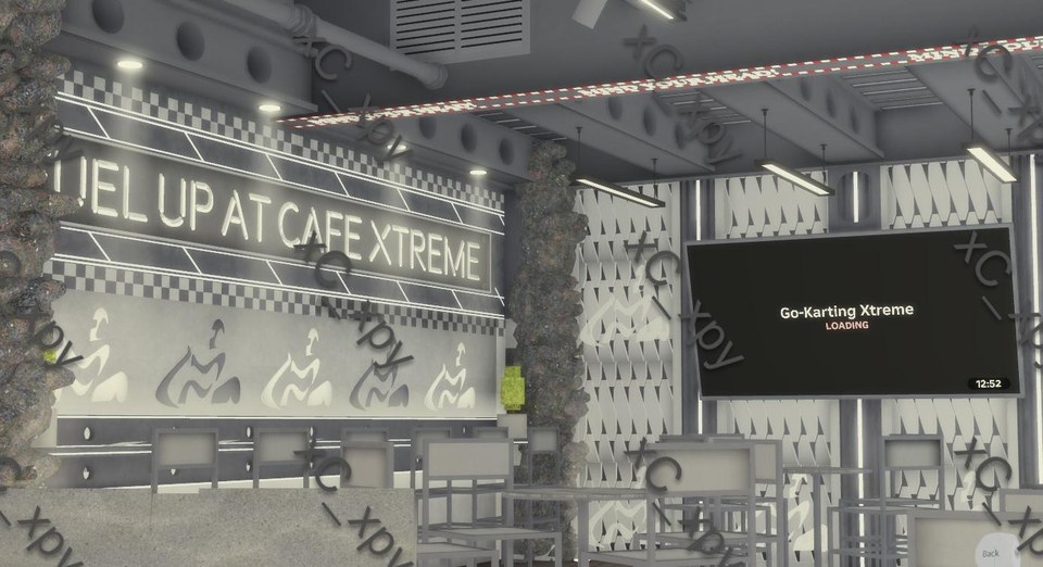 Café Xtreme service counter with racing graphics, display screen and Fuel Up signage