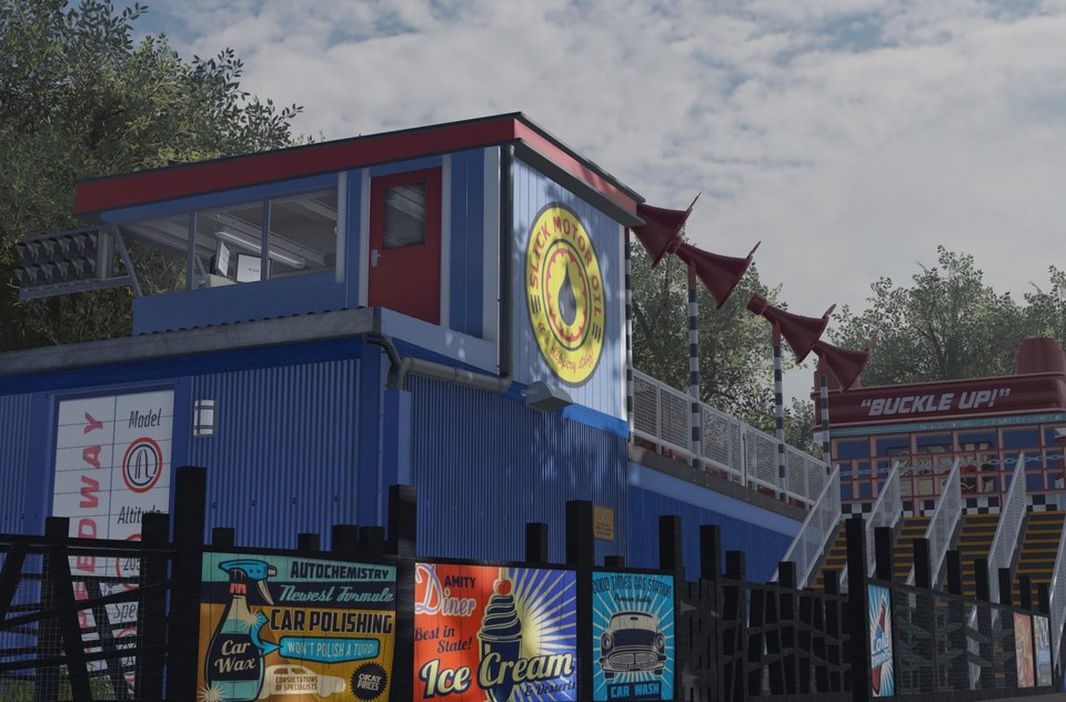 Roblox recreation of a colourful coaster station building with posters, fencing and trees