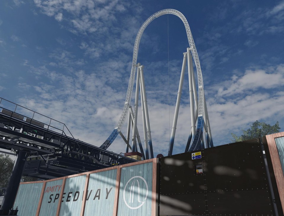 Wide Roblox recreation view of Stealth coaster rising above the station under a cloudy blue sky