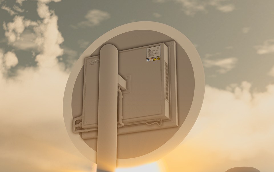 Rear view of circular display hardware with enclosure, cable loop and support pole