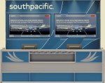 Front reference of South Pacific Airways gate desk with two monitors